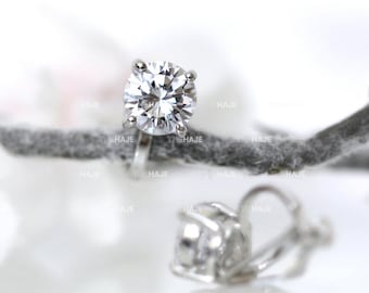 CZ Solitaire Clip On Stud Earrings: Rhodium or Gold Plated
