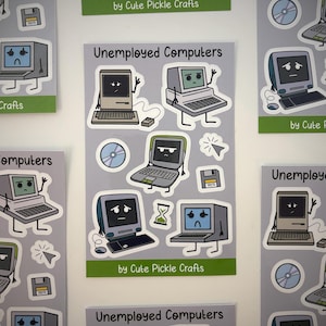 May include: A sticker sheet titled Unemployed Computers by Cute Pickle Crafts featuring cartoon illustrations of sad, anthropomorphic desktop computers, laptops, a floppy disk, a compact disc, a mouse cursor, and a loading hourglass icon.