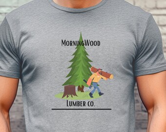 May include: A gray t-shirt with a cartoon illustration of a lumberjack carrying a log. The text "Morning Wood Lumber Co." is printed on the shirt.