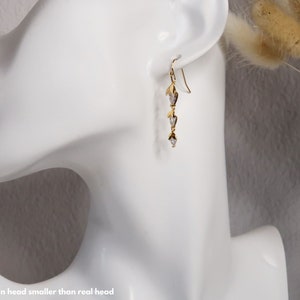 HAZEL Dainty nut earrings 18K gold plated Glittering hazelnut pendant with zircons Elegant, thin, long hanging earrings image 9