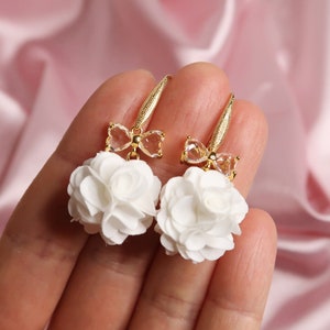 YUMI Sweet 18K Gold Plated Flower Dangle Earrings Zircon loop Fabric pompom pendant Handmade girls' earrings in white and pink White