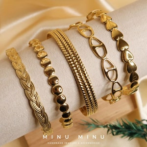 IRIDA Set di 5 braccialetti in acciaio inossidabile color oro Set di braccialetti moderni e alla moda Braccialetti unici di alta qualità come set o singolarmente immagine 1
