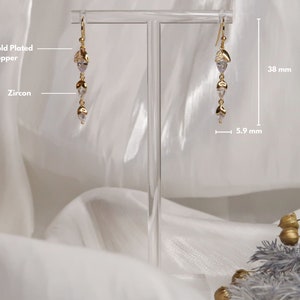 HAZEL Dainty nut earrings 18K gold plated Glittering hazelnut pendant with zircons Elegant, thin, long hanging earrings image 7