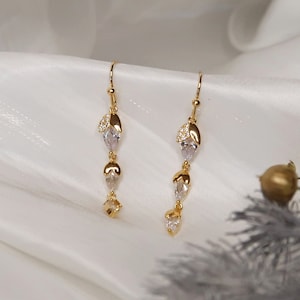 HAZEL Dainty nut earrings 18K gold plated Glittering hazelnut pendant with zircons Elegant, thin, long hanging earrings image 3