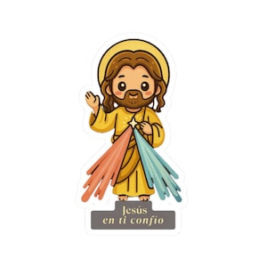 May include: A sticker featuring a cartoon illustration of Jesus in a yellow robe with a halo. Jesus is depicted with brown hair and a beard, with rays of light in pink, blue, and orange emanating from his chest. The text "Jesús en ti confío" is at the bottom.