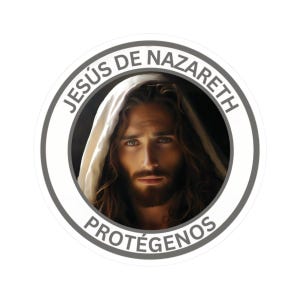 May include: A circular sticker with a portrait of Jesus, depicted with long brown hair and a beard, wearing a white robe. The text "JESÚS DE NAZARETH PROTÉGENOS" is printed around the image in a circular pattern, with a grey border.