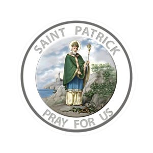 May include: Circular image featuring Saint Patrick, dressed in green and blue robes, holding a staff. The image includes the text "Saint Patrick" and "Pray for Us" in a silver border, with a background of a coastal landscape.