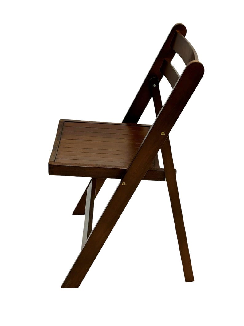 May include: A dark brown wooden folding chair with a slatted seat and a curved back.