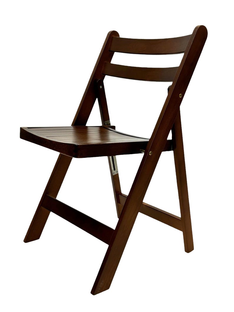 May include: A dark brown wooden folding chair with a slatted back and seat. The chair is made of solid wood and has a simple, classic design.