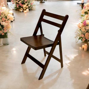 May include: A dark brown wooden folding chair with a slatted seat and back. The chair is standing on a light beige floor.