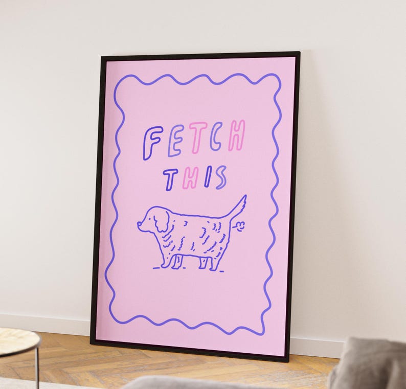 May include: A pink and blue illustrated print with a dog and the text "FETCH THIS" in a wavy border.