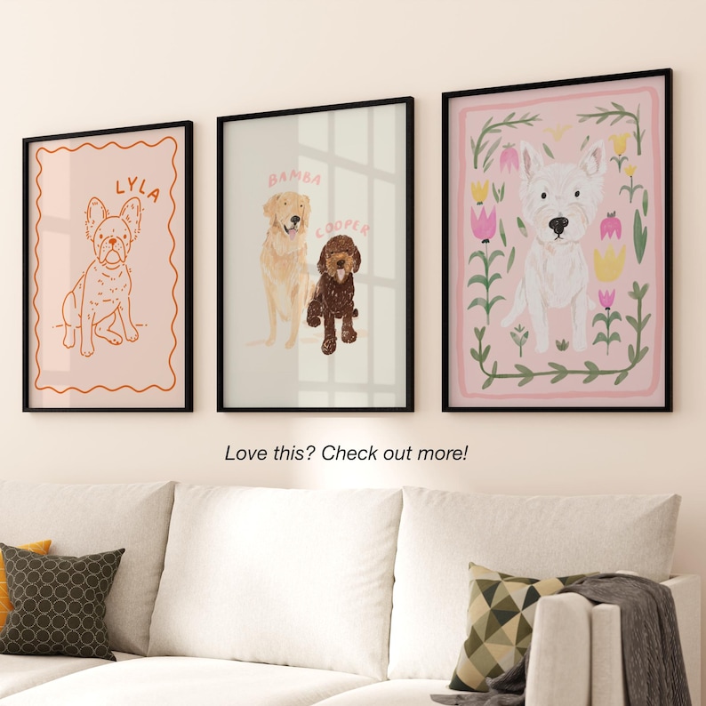 May include: Three framed illustrations of dogs. The first frame is pink with a white dog with the name "BAMBA" in orange text. The second frame is light blue with a brown dog with the name "COOPER" in orange text. The third frame is pink with a white dog with the name "LYLA" in orange text.
