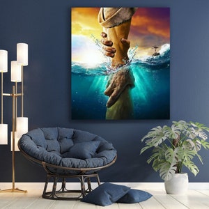 May include: A hand reaches out from the water, grasping another hand. The scene is set against a dramatic sunset sky with a small boat in the distance.