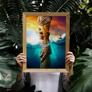 May include: A framed painting of a hand reaching out of the water to grasp another hand. The water is a vibrant blue and green, and the sky is a warm orange and yellow. The painting is set against a backdrop of lush green foliage.