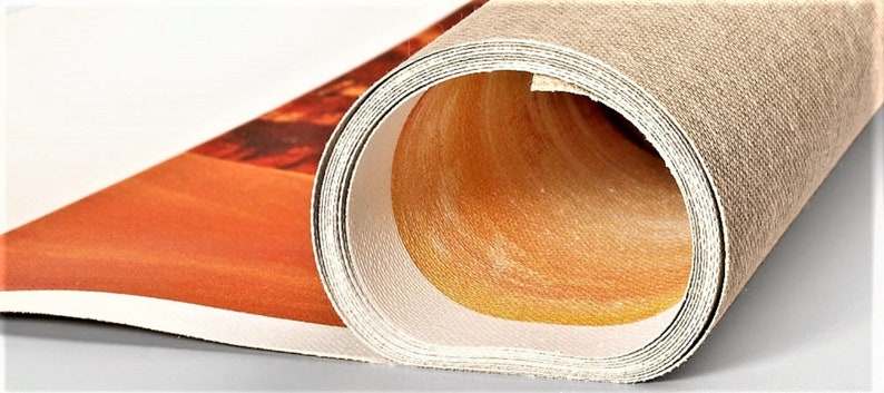 May include: A rolled canvas print with a close-up of the edges showing the texture of the canvas.
