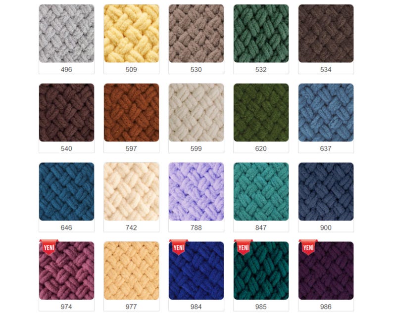 Pode incluir: Uma cole&ccedil;&atilde;o de fios de malha grossa em v&aacute;rias cores, incluindo cinza, amarelo, marrom, verde e azul. Cada amostra &eacute; rotulada com um n&uacute;mero. O fio parece macio e texturizado, adequado para projetos de artesanato.