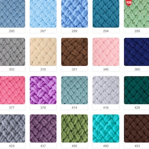 Pode incluir: Uma cole&ccedil;&atilde;o de amostras de fios de malha grossa e coloridas. Os quadrados exibem uma variedade de tons, incluindo azuis, rosas, verdes e castanhos. Cada amostra tem um n&uacute;mero impresso, como 280, 287 e 289.