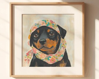 May include: A framed art print featuring a Rottweiler dog wearing a floral scarf and bonnet. The dog has black fur with brown markings. The artwork is in a wooden frame and hangs on a beige wall.