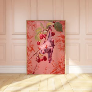 May include: A pink bat hangs upside down from a branch with red berries. The bat has a white face and is surrounded by a pink and red floral pattern.