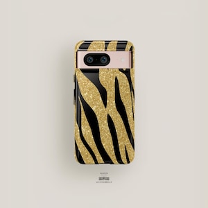 May include: A black phone case with a gold glitter zebra print design.