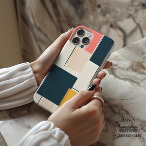 This abstract geometric phone case blends Bauhaus-inspired modern design with a mid-century color block aesthetic. A trendy yet protective cover for iPhone, Samsung & Google Pixel. Modern geometric phone case, Bauhaus abstract phone cover, mid-century iPhone Samsung case, Google Pixel artistic case, minimalist aesthetic phone case, retro color block phone case.