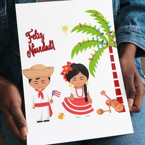 May include: A Christmas card featuring a cartoon illustration of a man and woman in traditional Puerto Rican clothing. The man is holding a Puerto Rican flag and the woman is holding a maraca. The card has the text "Feliz Navidad" in red lettering.