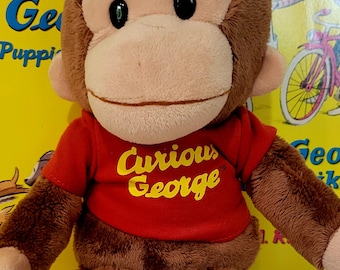Classic Curious George plush signature red t-shirt two books George rides a bike George and the puppies very good to excellent condition
