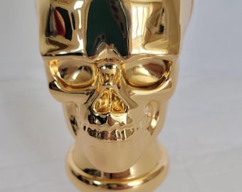 Collectible golden skull stopper wine bottle or decanter  associated with luxury barware EUC