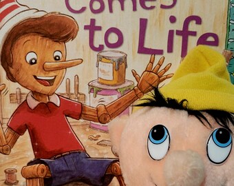 Pinocchio book with Pinocchio plush storytime classroom childrens library