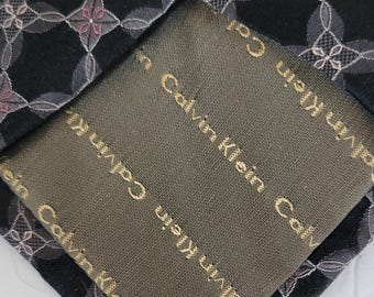 Calvin Klein black and patterned necktie EUC