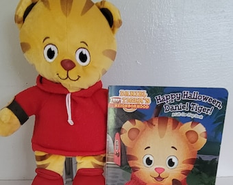 Daniel Tiger plush  Halloween  lift the flap book.