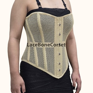 May include: A beige mesh corset with a lace-up front and a black background. The corset has a  "LaceBoneCorset" logo on the front.