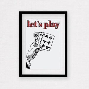 赤、黒、白の「Let's Play Game」ルームまたはバーの壁アート（カードを持つ手付き、シンプルで楽しい）