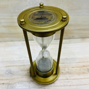 Reloj de arena vintage de 8 pulgadas, de metal y vidrio, con esfera de barco.