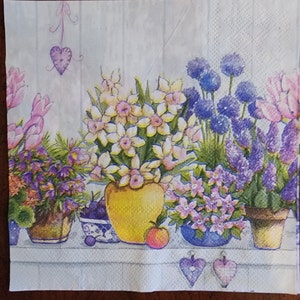 May include: A watercolor painting of a floral arrangement with purple, pink, and white flowers in pots. The flowers are arranged in a vase and two pots. The background is a light blue and white.