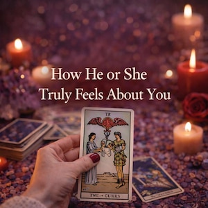 May include: A tarot card reading with the text "How He or She Truly Feels About You." The card held in a hand shows two figures and the words "Two Currs." The background includes lit candles and other tarot cards.