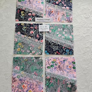 May include: Four sets of fabric squares with lace trim. Each set has two squares, one pink and one blue, with a floral pattern. The squares are arranged in a grid pattern. The text "Rayfield's Cottage" and "D-1-18 18 x 5" squares with lace" is visible on the image.