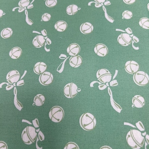 By the 1/2 yard Deer Christmas by Urban Chiks. Green with Cream Christmas bells, out of print fabric, rare