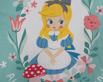 May include: A whimsical illustration of Alice from Alice in Wonderland, surrounded by flowers and a mushroom. Alice, with blonde hair and a blue dress, is centered within a floral wreath. The words "Alice in Wonderland" are printed in white on a teal background.