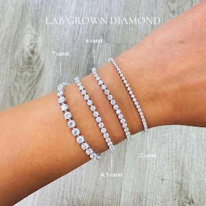 May include: Four diamond tennis bracelets of varying carat weights are displayed on a wrist. The bracelets are labeled as 2, 4, 4.5, and 7 carat. The text "LAB GROWN DIAMOND" is at the top of the image.