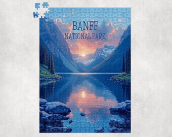 Könnte beinhalten: Ein fertiges Puzzle mit einer malerischen Aussicht auf den Banff-Nationalpark. Das Bild zeigt einen See, der die Berge und den Sonnenuntergang widerspiegelt, mit dem Text "BANFF NATIONAL PARK" oben. Das Puzzle ist überwiegend blau, mit einigen noch getrennten Teilen.