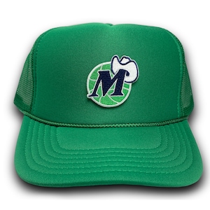 May include: Green trucker hat with a green, white, and blue embroidered patch of a cowboy hat over a letter "M" on a basketball.