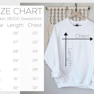 May include: Size chart for Gildan 18000 sweatshirts, showing measurements in inches for sizes S through 4XL. The chart lists length and chest measurements.
