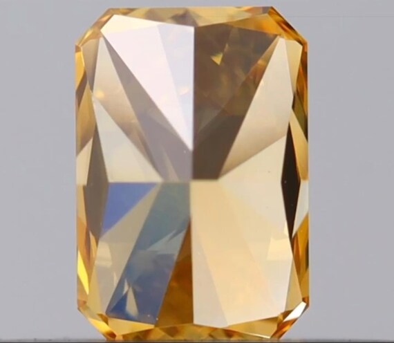 0.25 Ct. Fancy Vivid Orange-yellow, Natural Even, VS1 Radiant