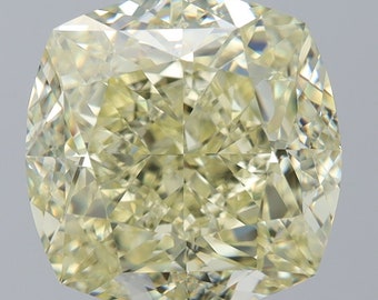 GIA Cert. Fancy Diamond - 5.06 ct. Fancy Light Yellow, Natural Even, VVS2 Cushion