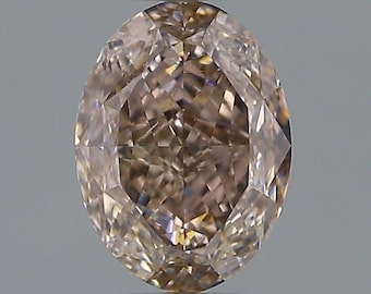 May include: A light brown oval-shaped diamond with a faceted cut.