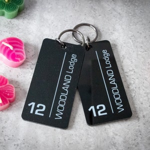 Personalized hotel keychains - custom key holder with motel name and room number - key tag for hostels and B&Bs - custom keyring.