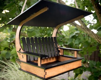 Bird feeder kit, Swing model made of black matt acrylic and birch plywood with palisander stain. Perfect as a handmade gift.