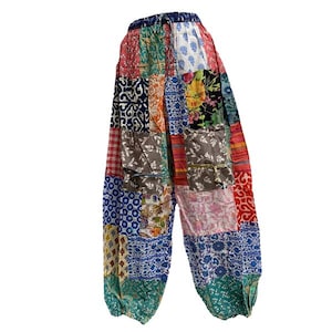 May include: Patchwork pants with a variety of colorful floral and geometric patterns. The pants have a wide leg and a drawstring waist.