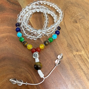 Collana con ciondolo a forma di mala con perline di cristallo di quarzo 7 Chakra Om 108, realizzata a mano, con pietre preziose e gioielli per yoga.